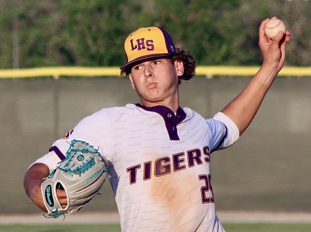 The Tigers' Andrew Mora pitches in relief in the seventh inning of Friday's Division II playoff game against Lompoc.